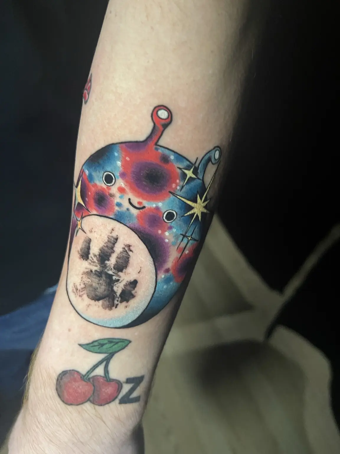 Small full-color cartoon character tattoo by Keith