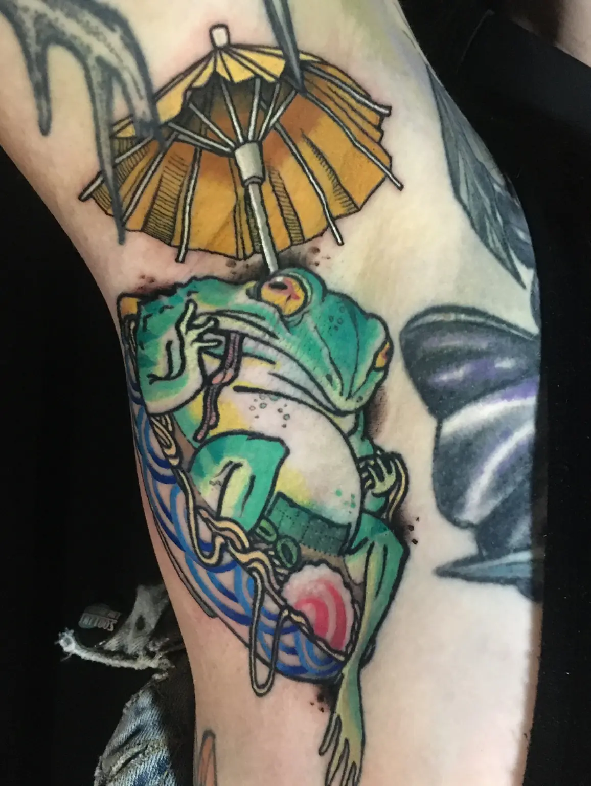 Full-color Japanese-inspired frog and umbrella tattoo by Keith